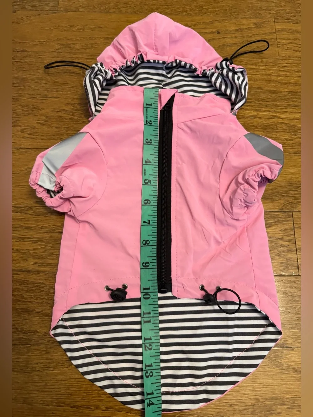 OKpangcho dog raincoat (pink, size M). Features a detachable hood, making it a v